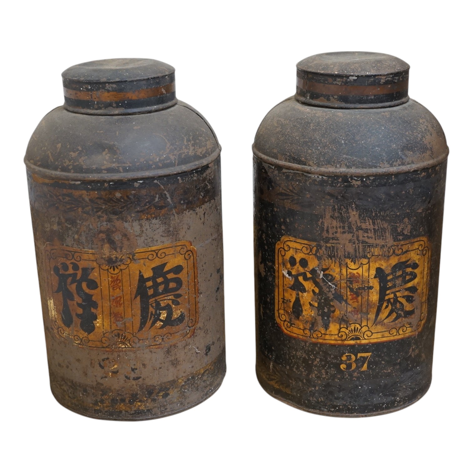 Two painted tin tea caddies, 43cm high. Condition - poor
